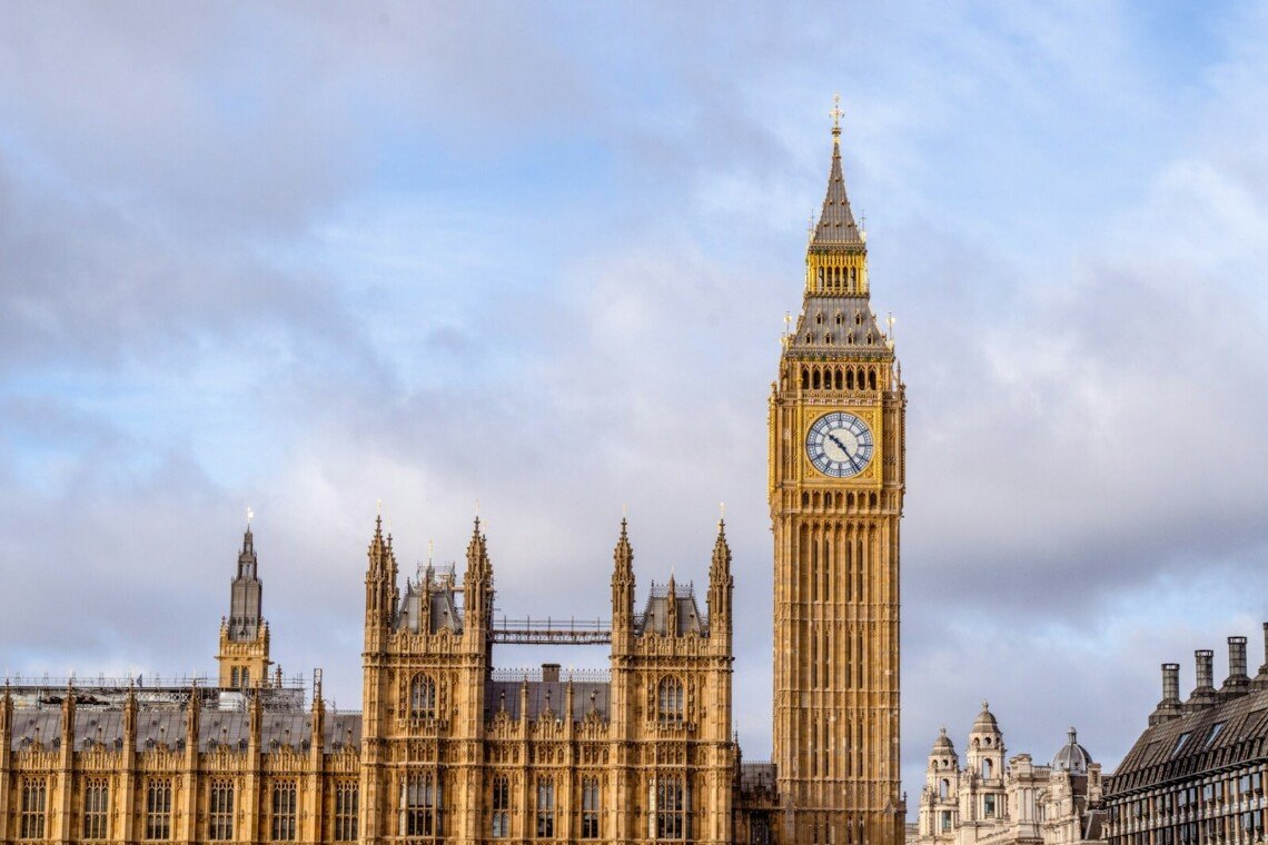 the big ben clock tower towering over the city of london