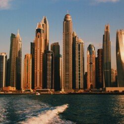 high rise buildings near sea during daytime